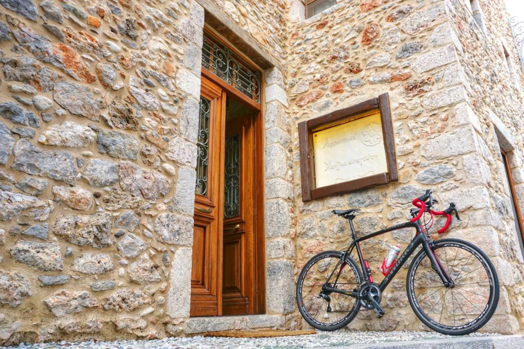 A bike at the entrance of the bike friendly hotel Hatzipanagiotis in Leonidio