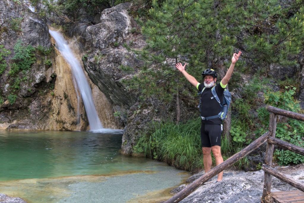 Cyclist before jumping into the river stream mt Olympus