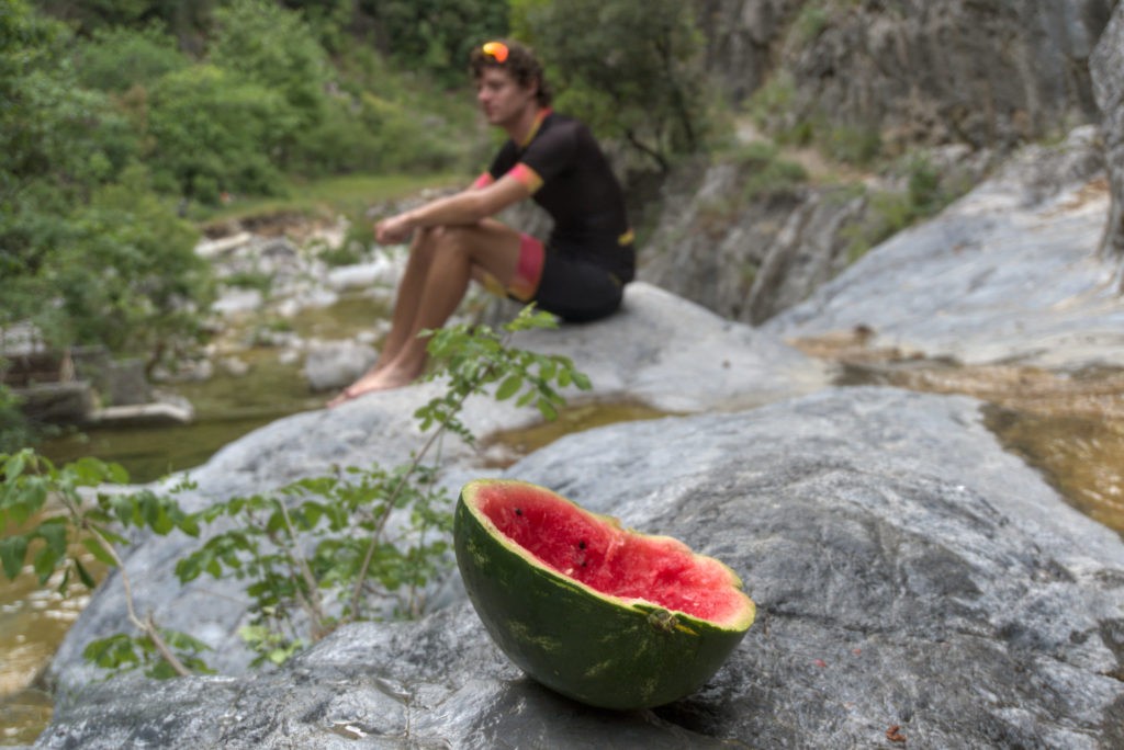 A slice of watermelon that the cyclist ate to cool off