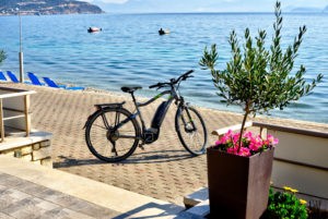 View of a bicycle in front of the sea, the view from Sunset Hotel