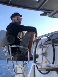 Our sailing captain overlooking the sea to find a proper berthing dock